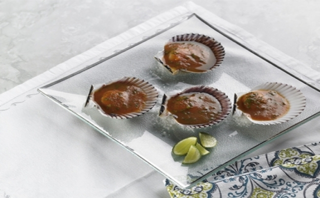 Conchitas al pisco y tomate